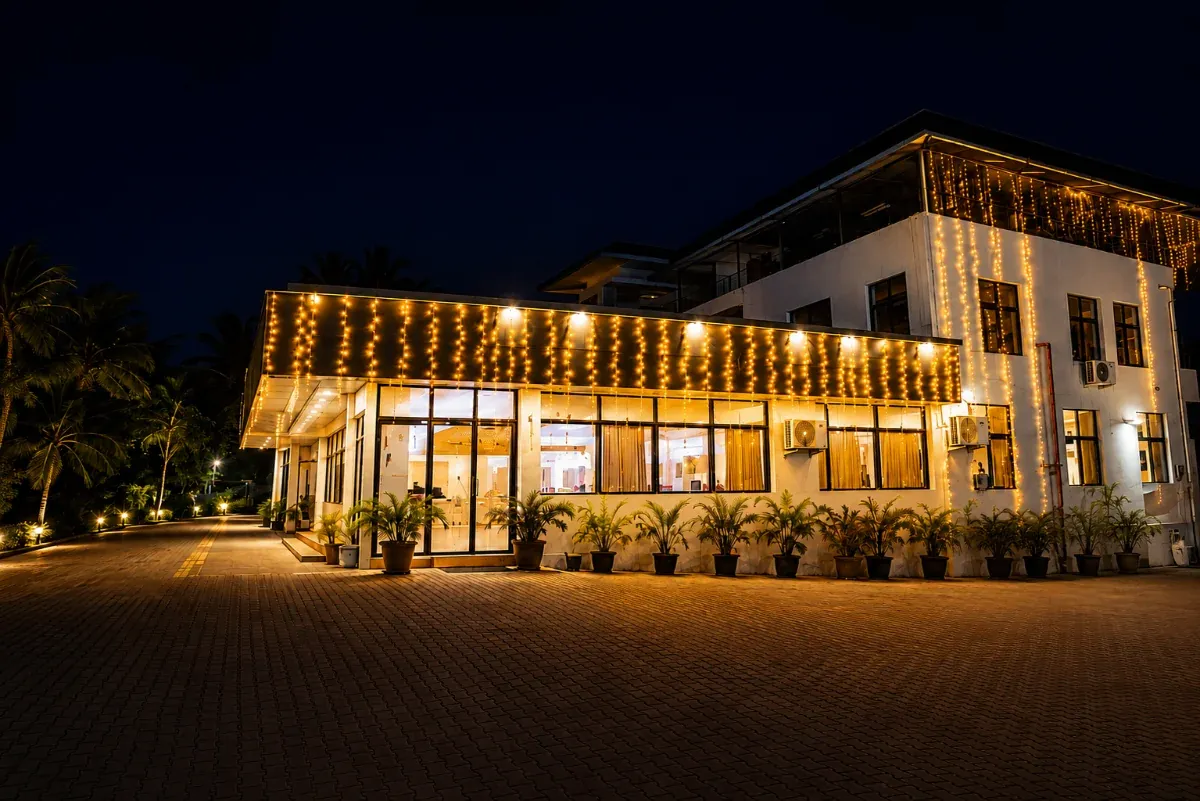 S P Convention Center lit with string lights at night in Naruvamoodu, Trivandrum